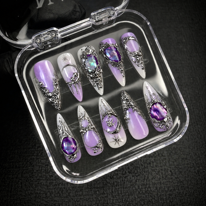 Open Nail Handy package presenting the Violet Relic press-on nail set and its coordinated contents.
