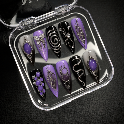 Open Nail Handy package presenting the Violet Relic press-on nail set and included materials.