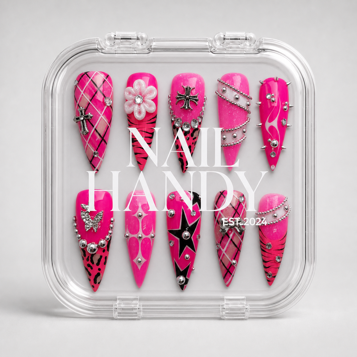 Pink Rebel Mix press-on nail set shown with Nail Handy branded package box.