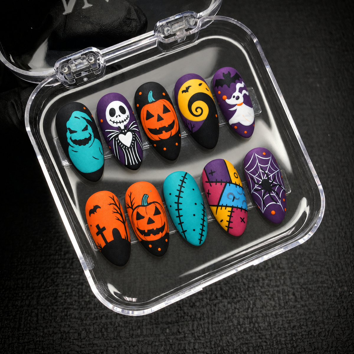 Open Nail Handy branded package box with the Spooky Storybook press-on nail set.