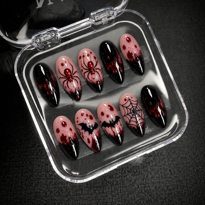 Open Nail Handy package displaying the Crimson Web press-on nail set and included contents.