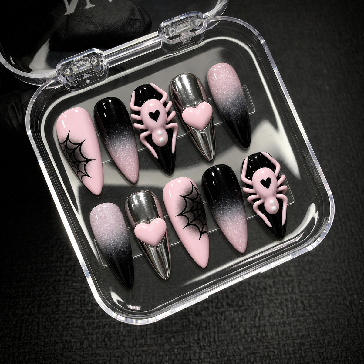 Open Nail Handy package displaying the Blush Web Spider press-on nail set and included presentation materials.