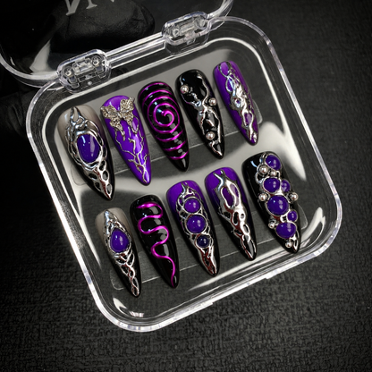 Open Nail Handy branded package box presenting the Midnight Violet Flutter press-on nail set.