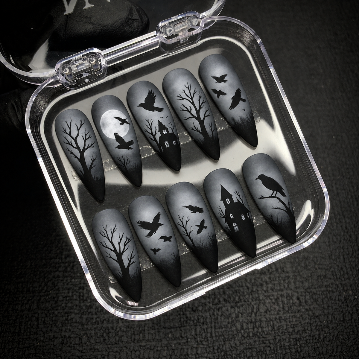 Open Nail Handy package displaying the Witchy Raven press-on nail set.