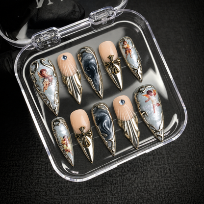 Open Nail Handy package displaying the Fallen Angel press-on nail set.