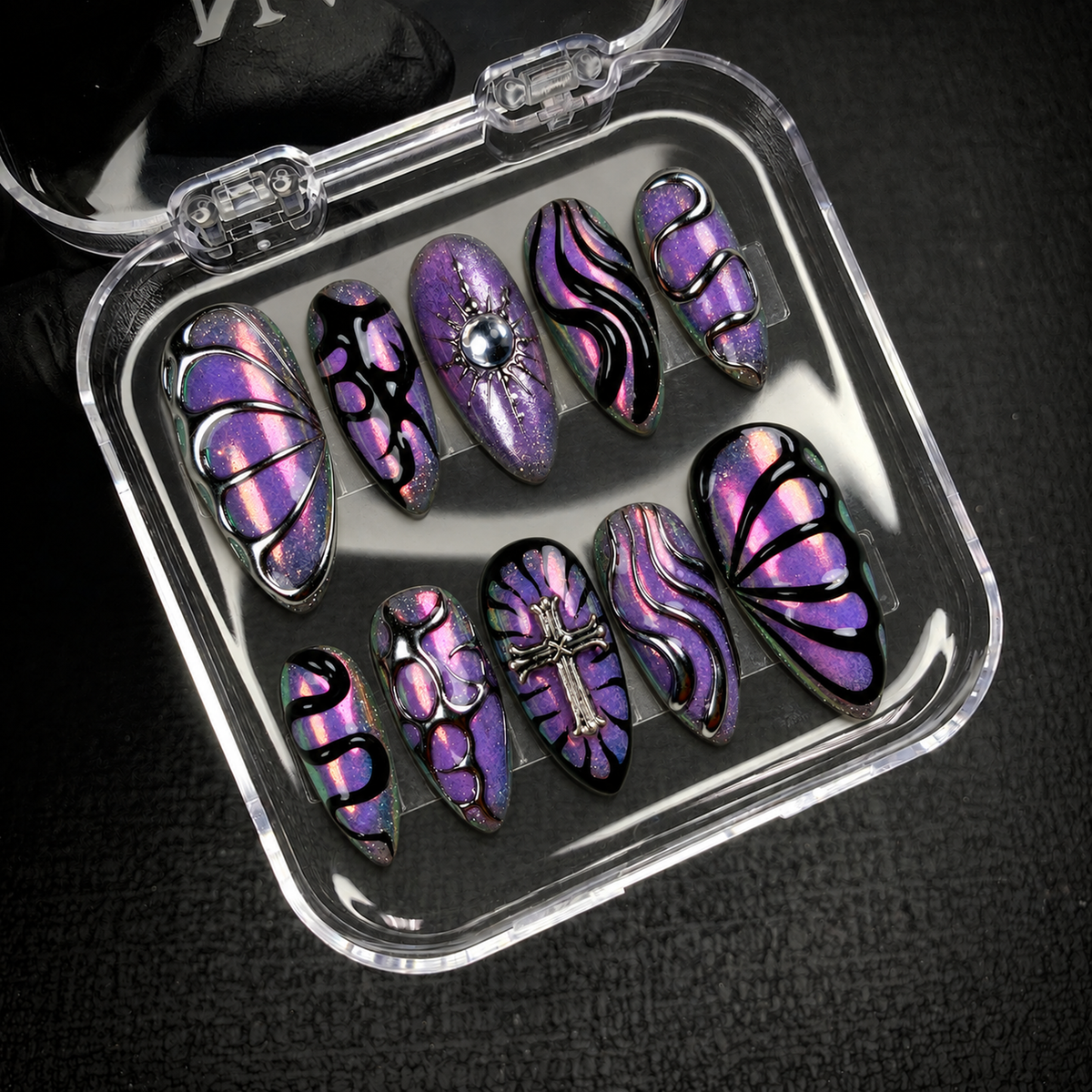 Open Nail Handy package displaying the Chrome Eclipse Cross press-on nail set and included contents.