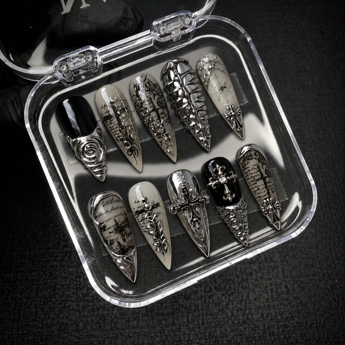 Open Nail Handy package displaying the Chrome Cathedral press-on nail set and included presentation materials.