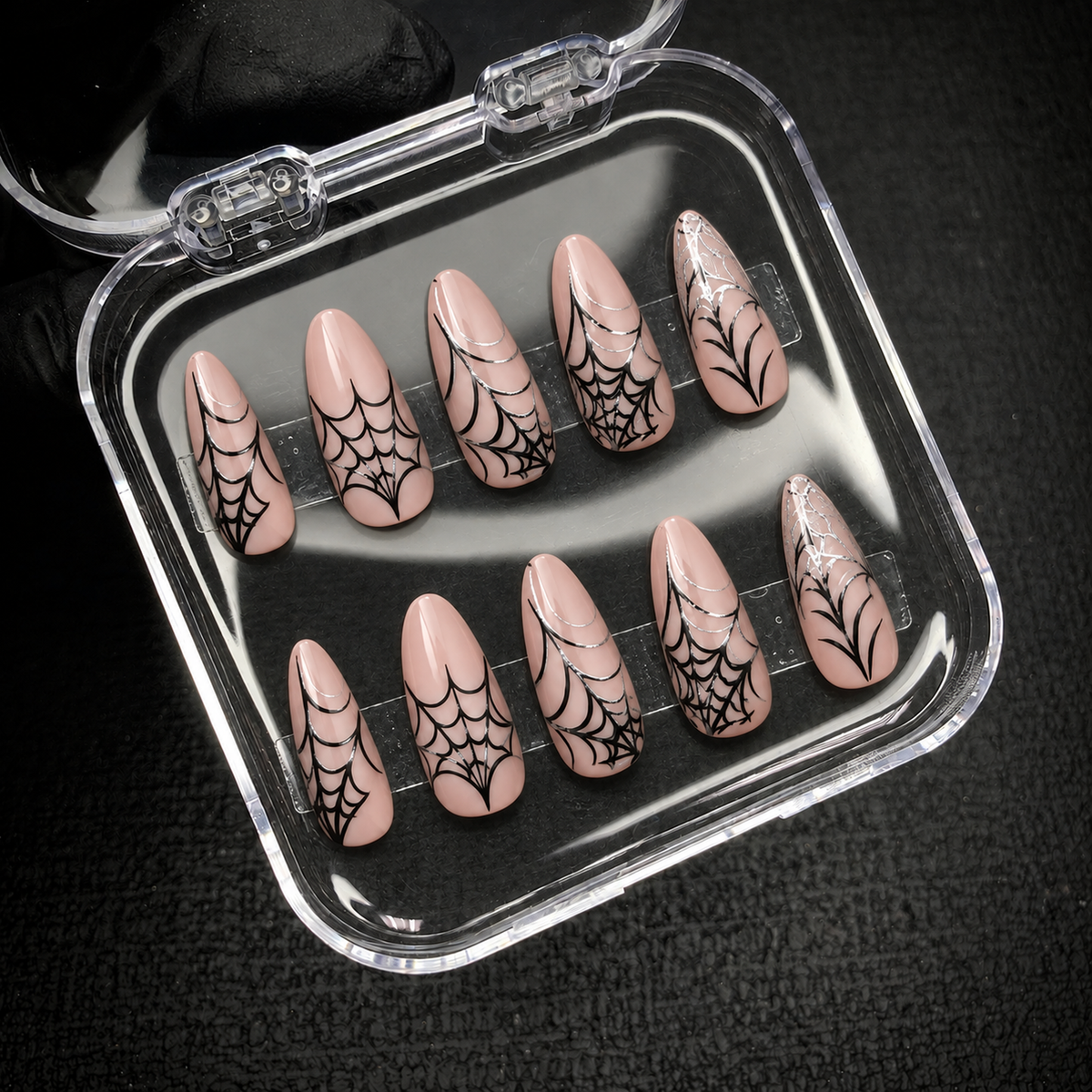 Open Nail Handy package box containing the Midnight Webline press-on nail set.