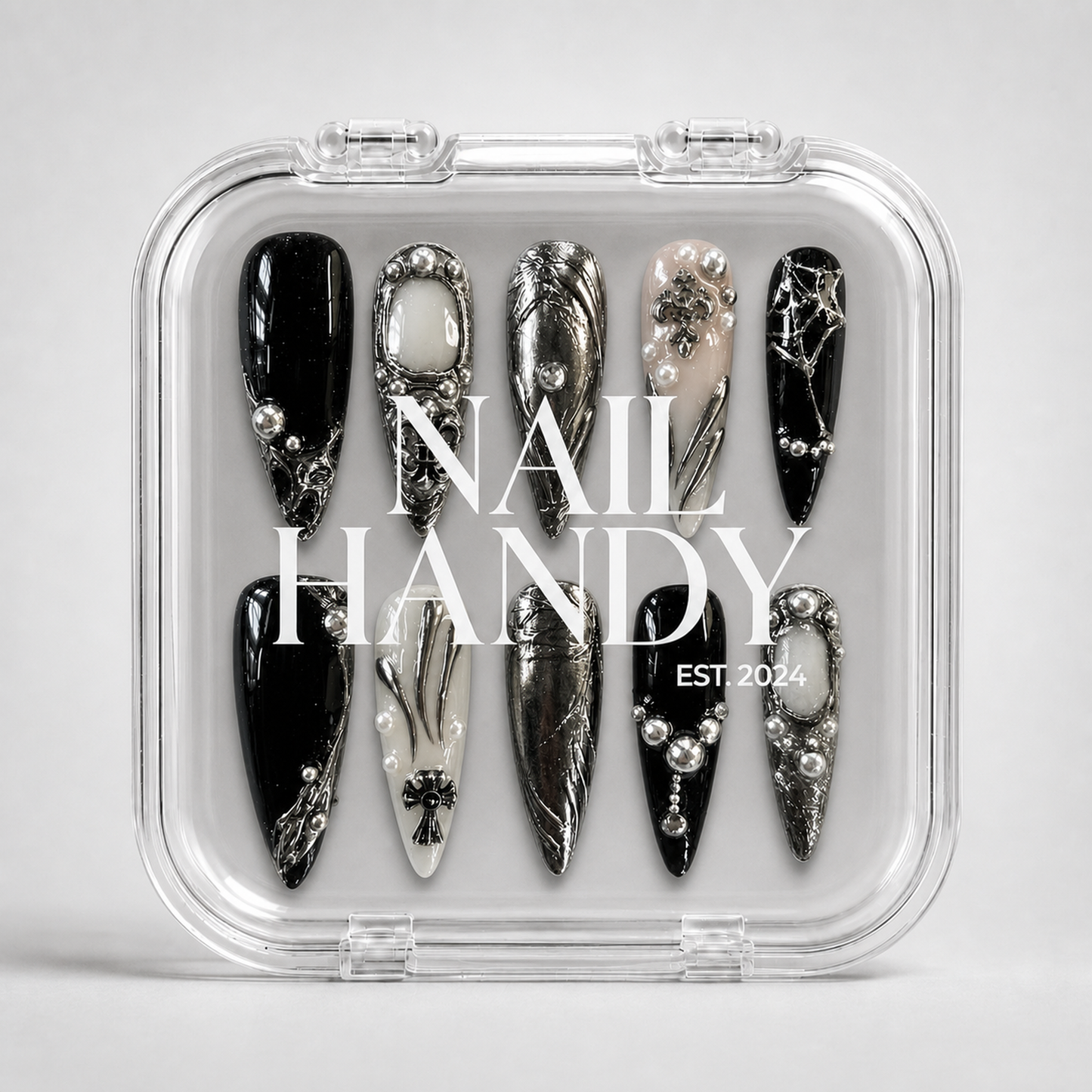 Closed Nail Handy branded package for the Chrome Reliquary press-on nail set.