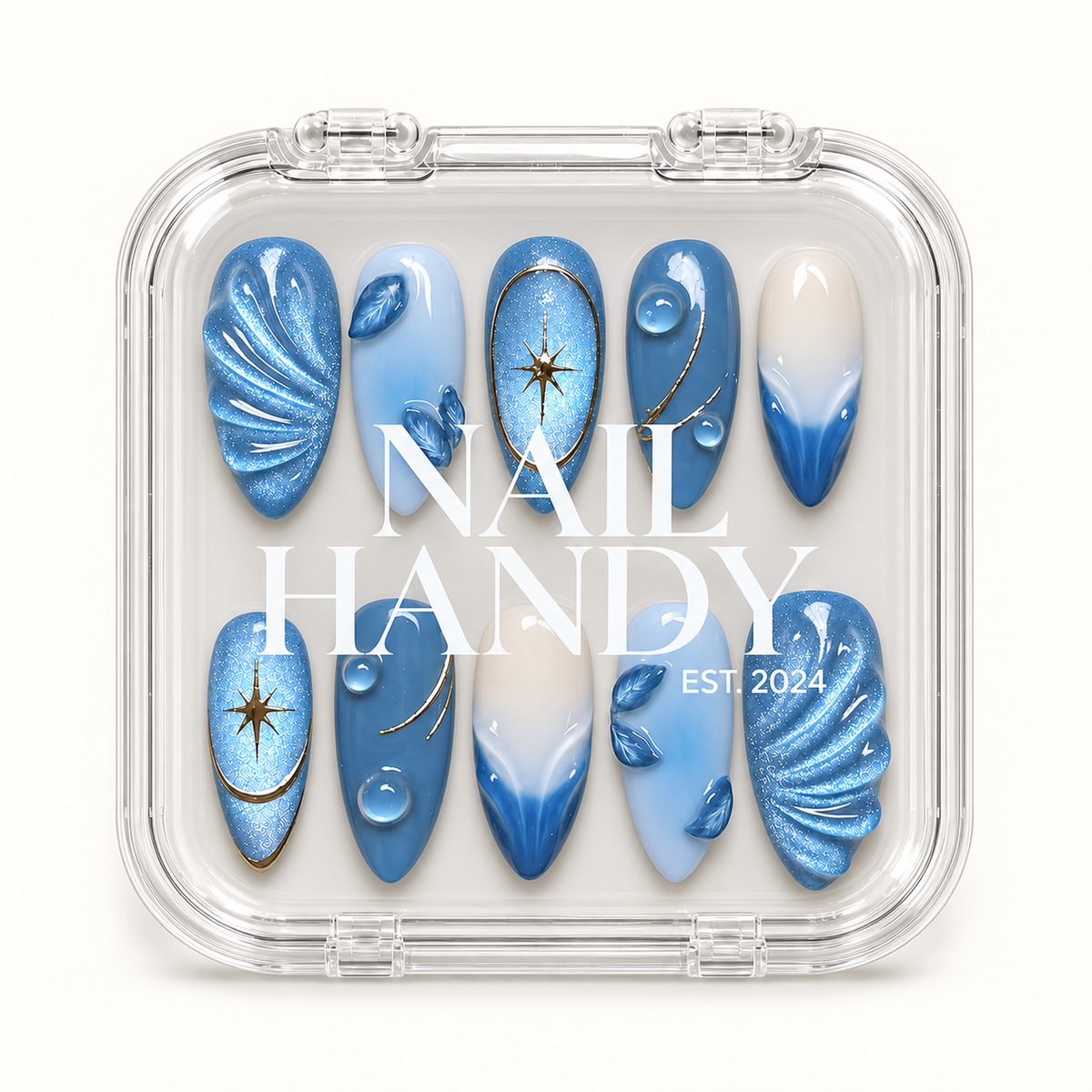 Clear Nail Handy case displaying ten blue and white nails with shimmering folds, leaves, gold stars, and gradient accents.