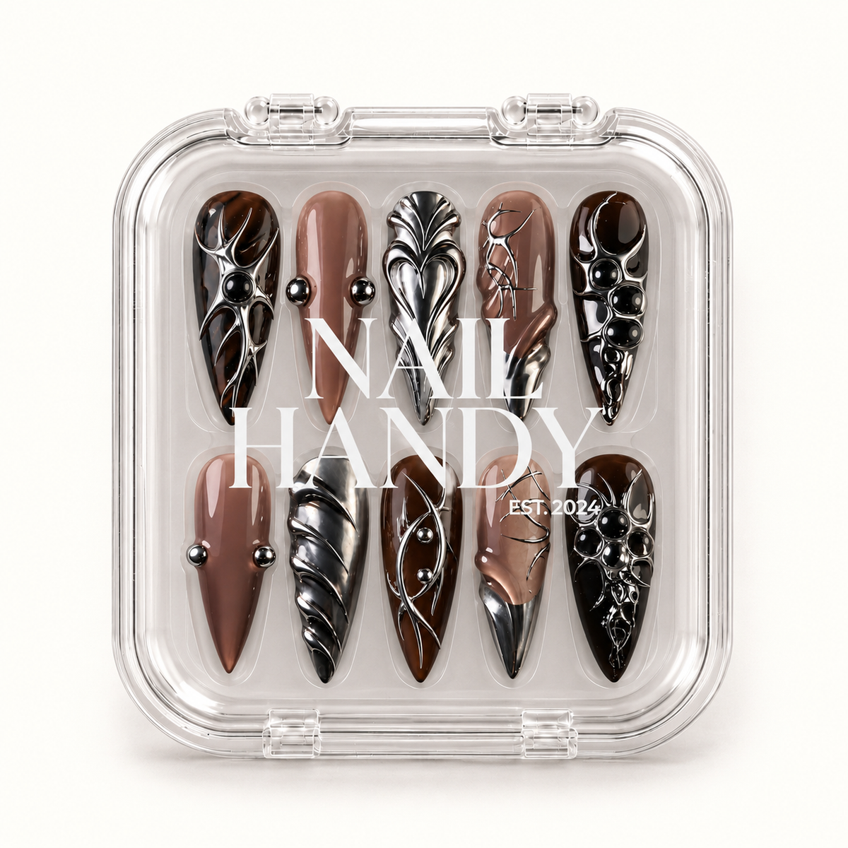 Closed clear Nail Handy case displaying ten coordinated mocha and taupe nails with reflective silver-toned details and black rounded accents.