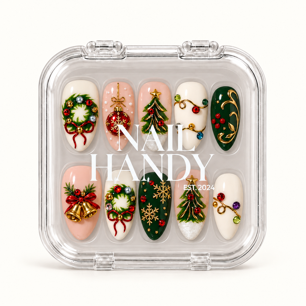 Closed clear Nail Handy case displaying ten Christmas press-on nails with wreaths, trees, bells, ornament details, and snowflakes.
