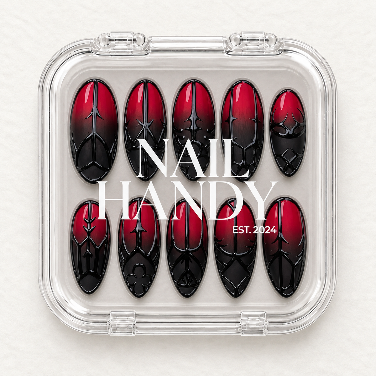 Closed Nail Handy branded package for the Crimson Gate press-on nail set.