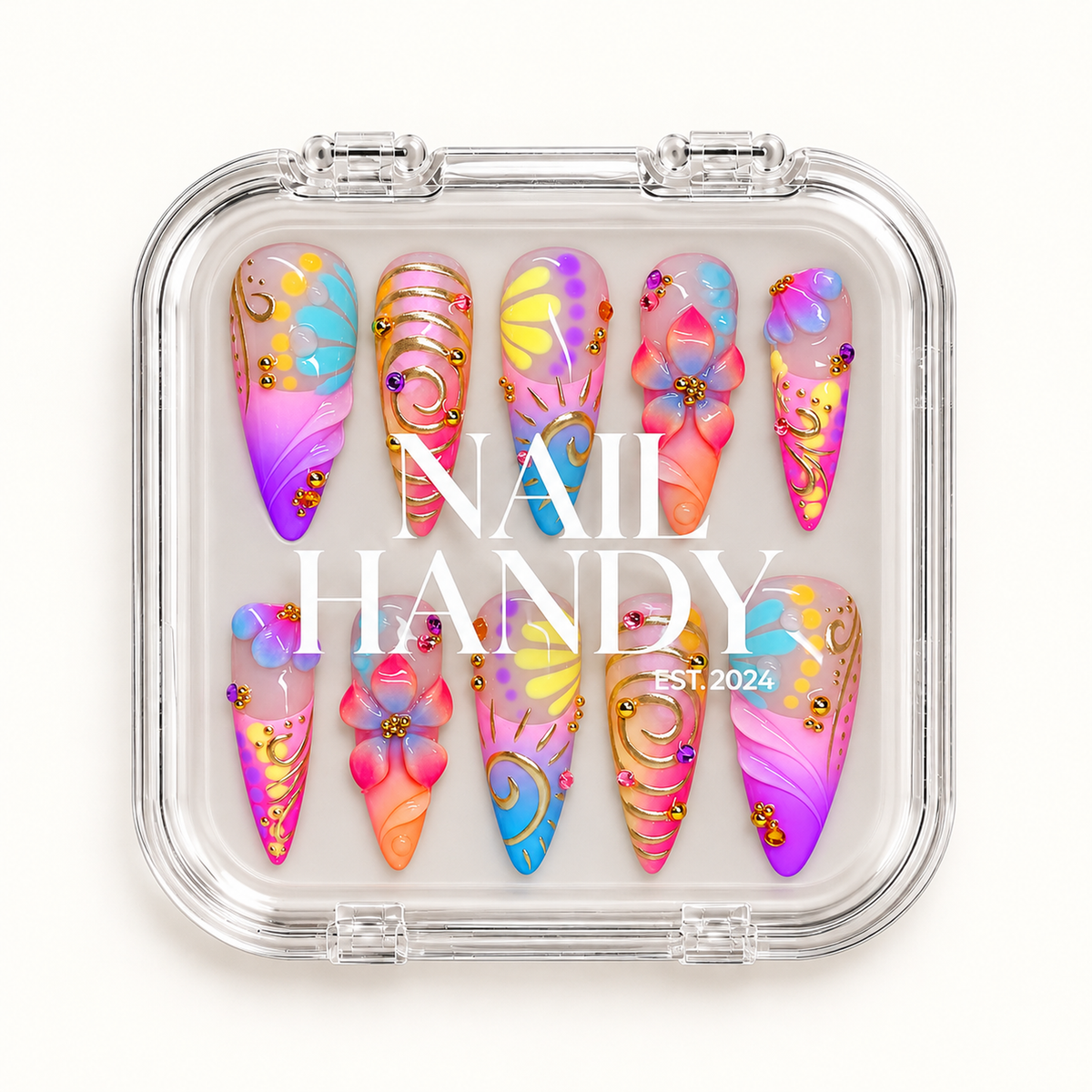 Closed clear Nail Handy case displaying ten colorful floral and swirl nails beneath white branding on the lid.