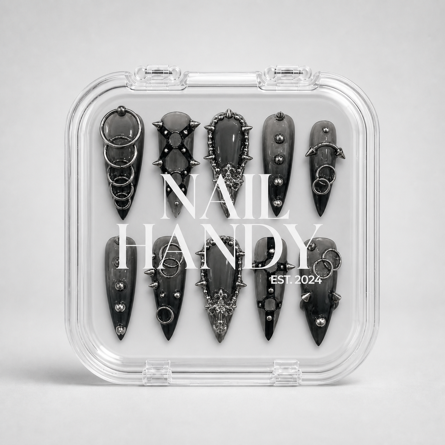 Closed Nail Handy branded package for the Iron Reliquary press-on nail set.