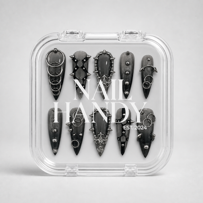 Closed Nail Handy branded package for the Iron Reliquary press-on nail set.