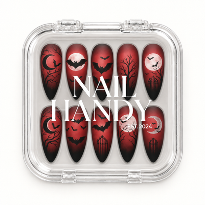 Nail Handy package presentation for Crimson Moonflight press-on nails with a crimson, black, bat, and moon design.