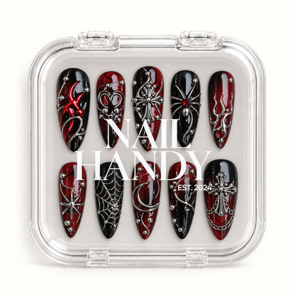 Closed Nail Handy branded package box for the Crimson Web Relic press-on nail set.