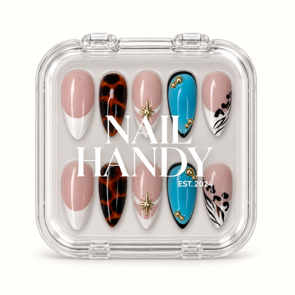 Closed clear Nail Handy case displaying ten coordinated nails in two rows, with white branding across the lid and turquoise, tortoiseshell, and nude French designs inside.