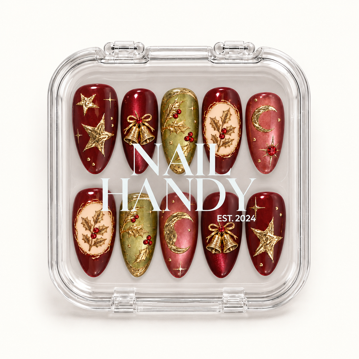 Closed clear Nail Handy case holding ten coordinated holiday press-on nails in two rows, with burgundy, olive, rose, and gold-tone details.