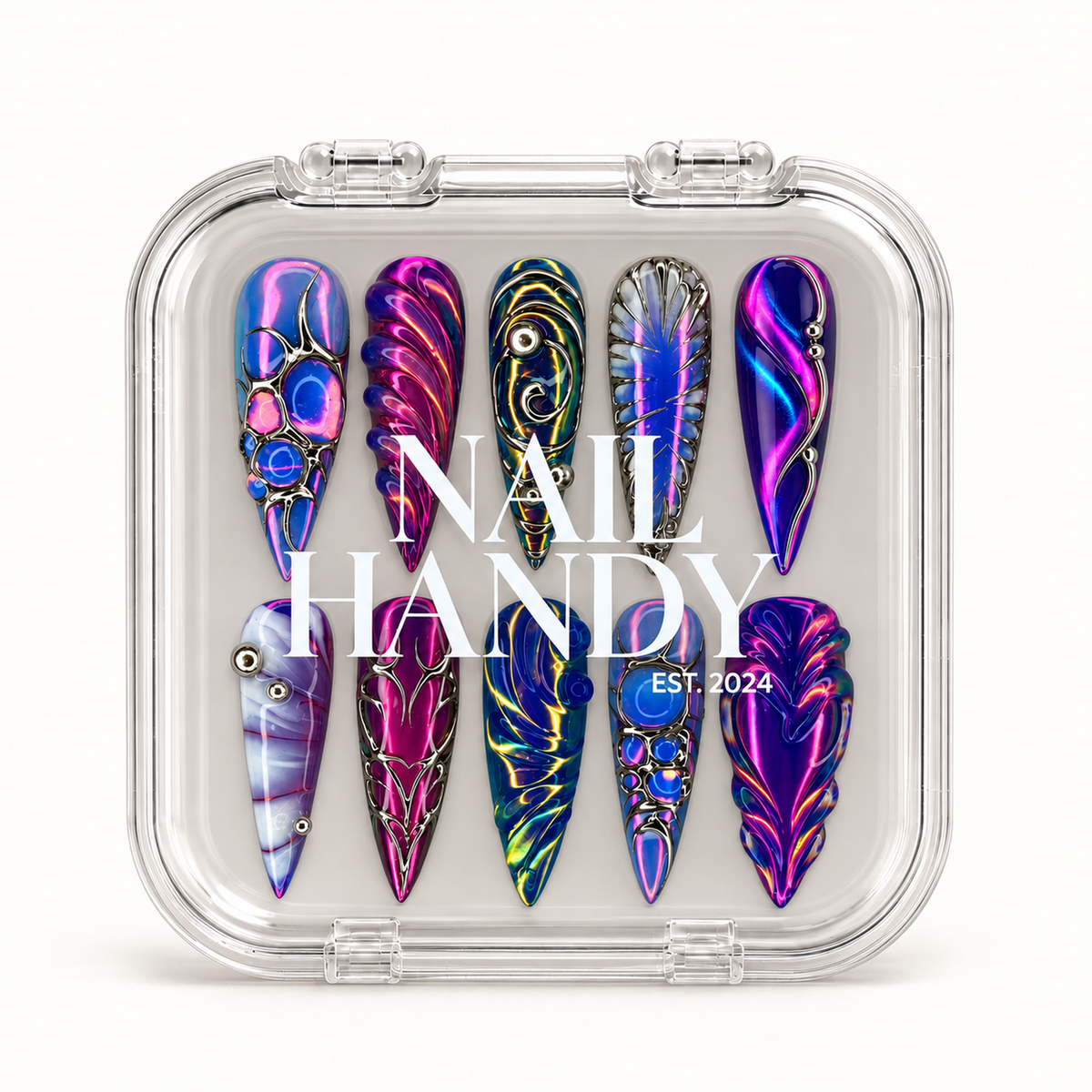 Closed clear case displaying ten blue, violet, and magenta patterned nails beneath white Nail Handy branding on a light background.