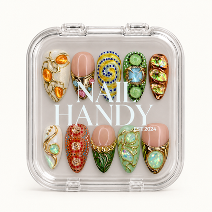 Closed clear Nail Handy case displaying ten coordinated multicolor nails in two rows beneath white lid lettering.