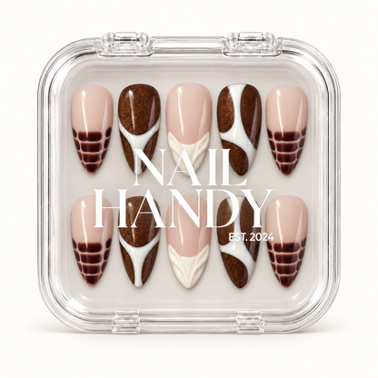 Closed clear case with white Nail Handy branding, displaying ten nude pink and cocoa brown nails with ivory accents in two rows.