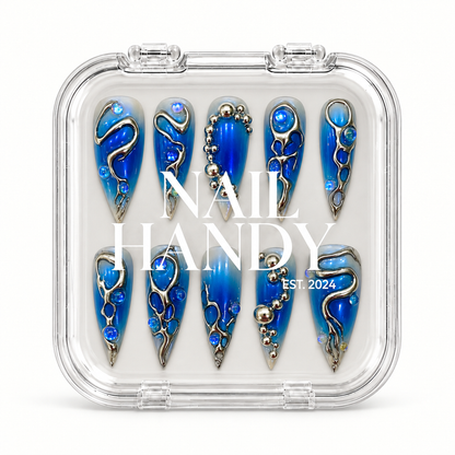 Nail Handy branded package box for the Aurora Chrome Tide press-on nail set.