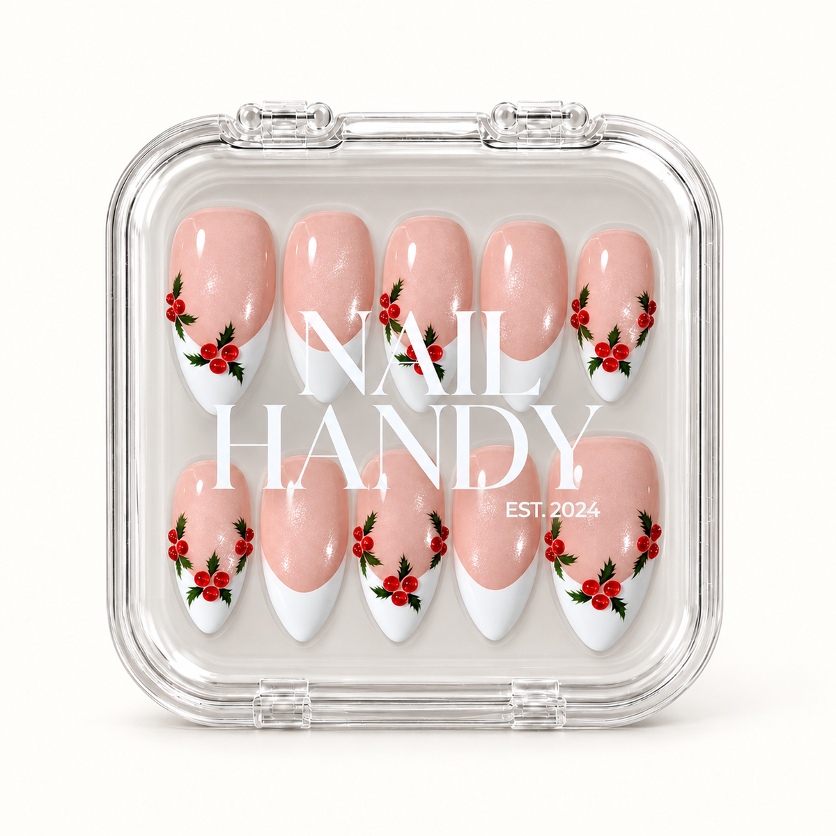 Closed clear Nail Handy case displaying ten pink shimmer French tip nails with red berries and green holly leaves in two rows.