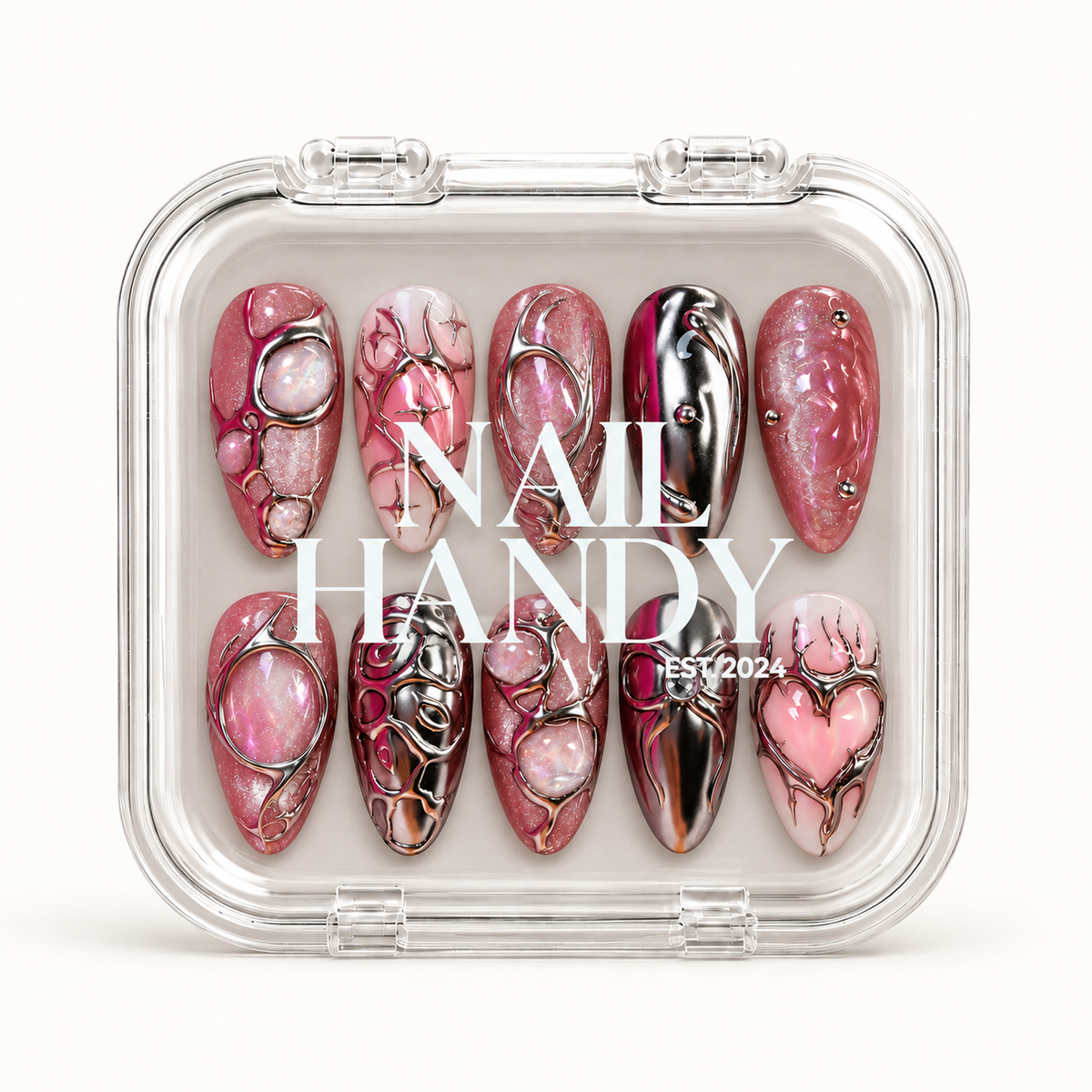 Closed clear Nail Handy case displaying ten pink and silver nails in two rows beneath white branding on the lid.
