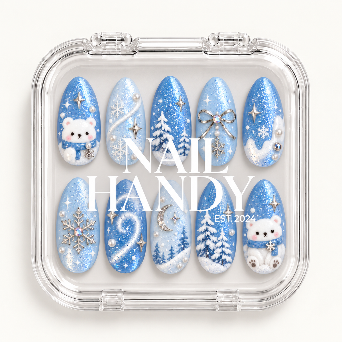 Closed clear Nail Handy case displaying ten coordinated blue winter nails in two rows, with white branding across the lid.