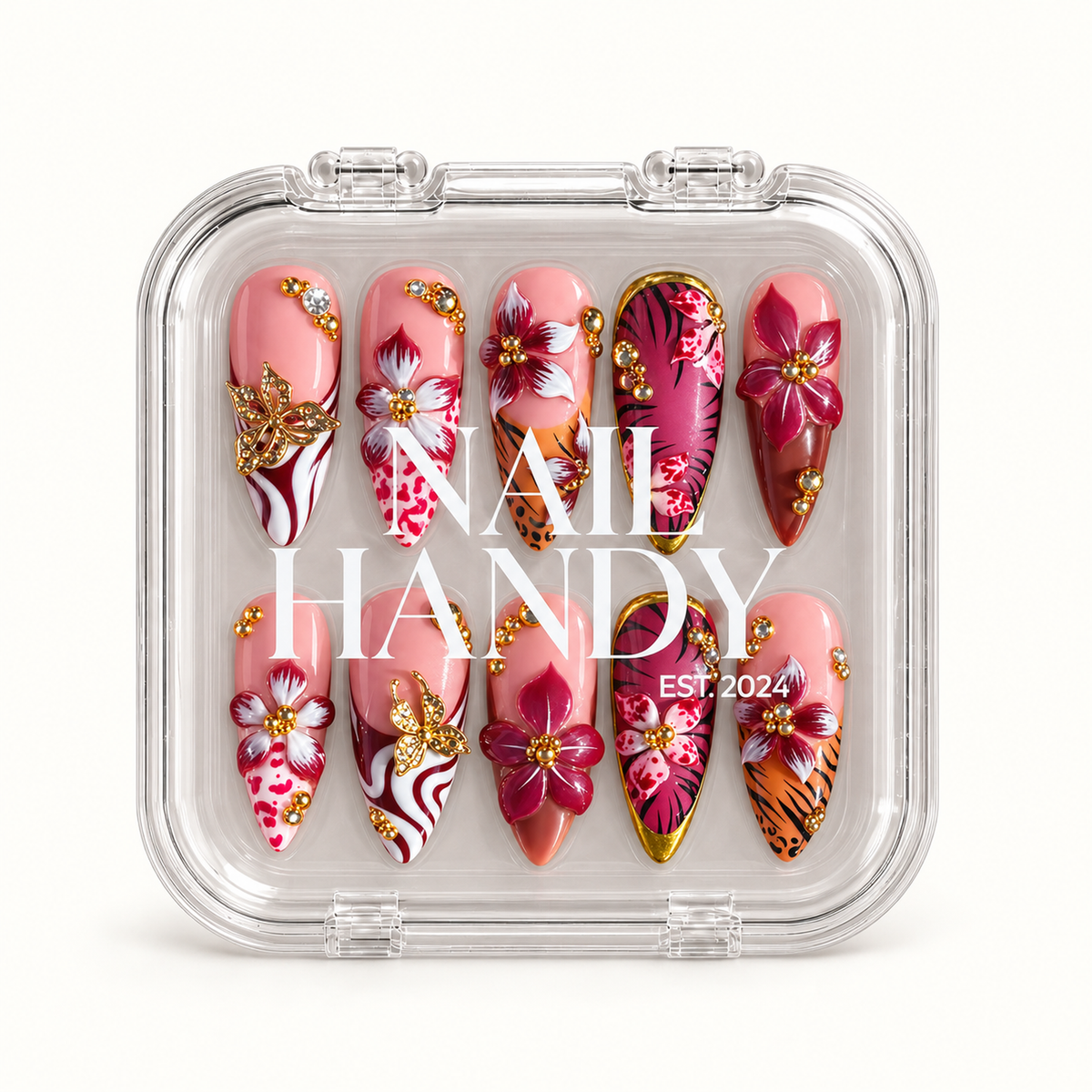 Closed clear Nail Handy case displaying ten coordinated floral and animal-print nails beneath white branding.