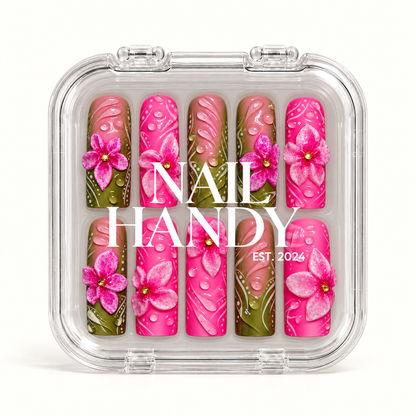 Closed clear Nail Handy case displaying ten pink and olive green nails with raised flowers, glossy droplets, and white decorative lines.