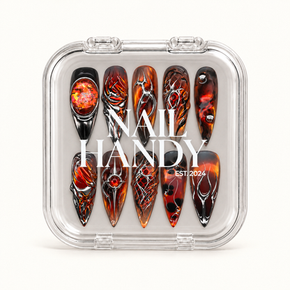 Closed clear Nail Handy case displaying ten Molten Chrome nails in two rows, with white branding across the lid.
