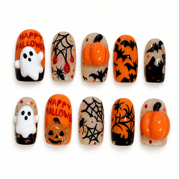 Ten coordinated Halloween press-on nails in orange, black, and warm neutral tones with pumpkins, ghosts, bats, spiderwebs, and sparkle accents.