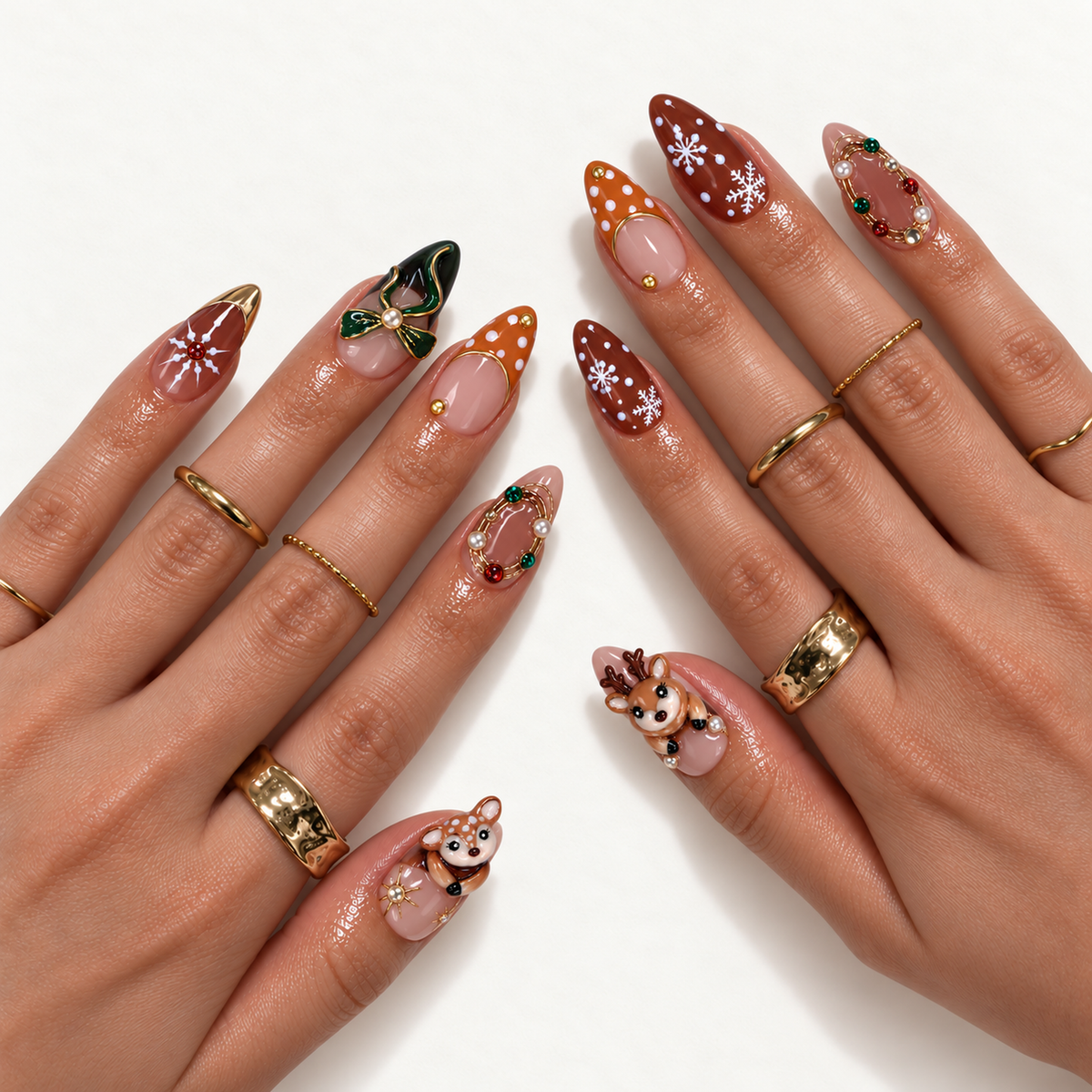 Hand model mockup showing the Christmas nail design with reindeer thumb accents, green bows, spotted caramel tips, and white snowflakes.