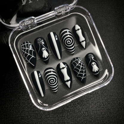 Open Nail Handy package box with the Midnight Spirit Web press-on nail set.