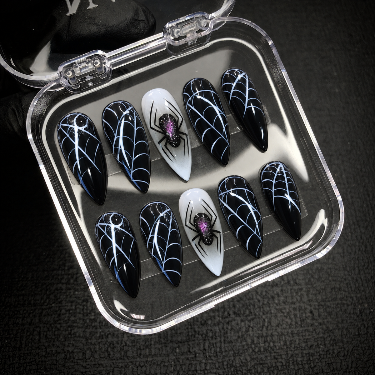 Open Nail Handy package displaying the Midnight Widow Web press-on nail set.