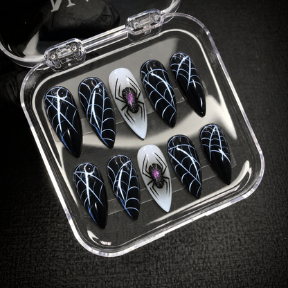 Open Nail Handy package displaying the Midnight Widow Web press-on nail set.