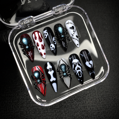Open Nail Handy package box displaying the Midnight Spider Web press-on nail set and included presentation materials.