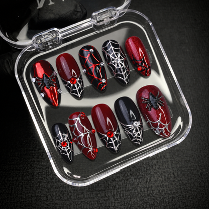 Open Nail Handy package displaying the Crimson Web press-on nail set and included presentation materials.
