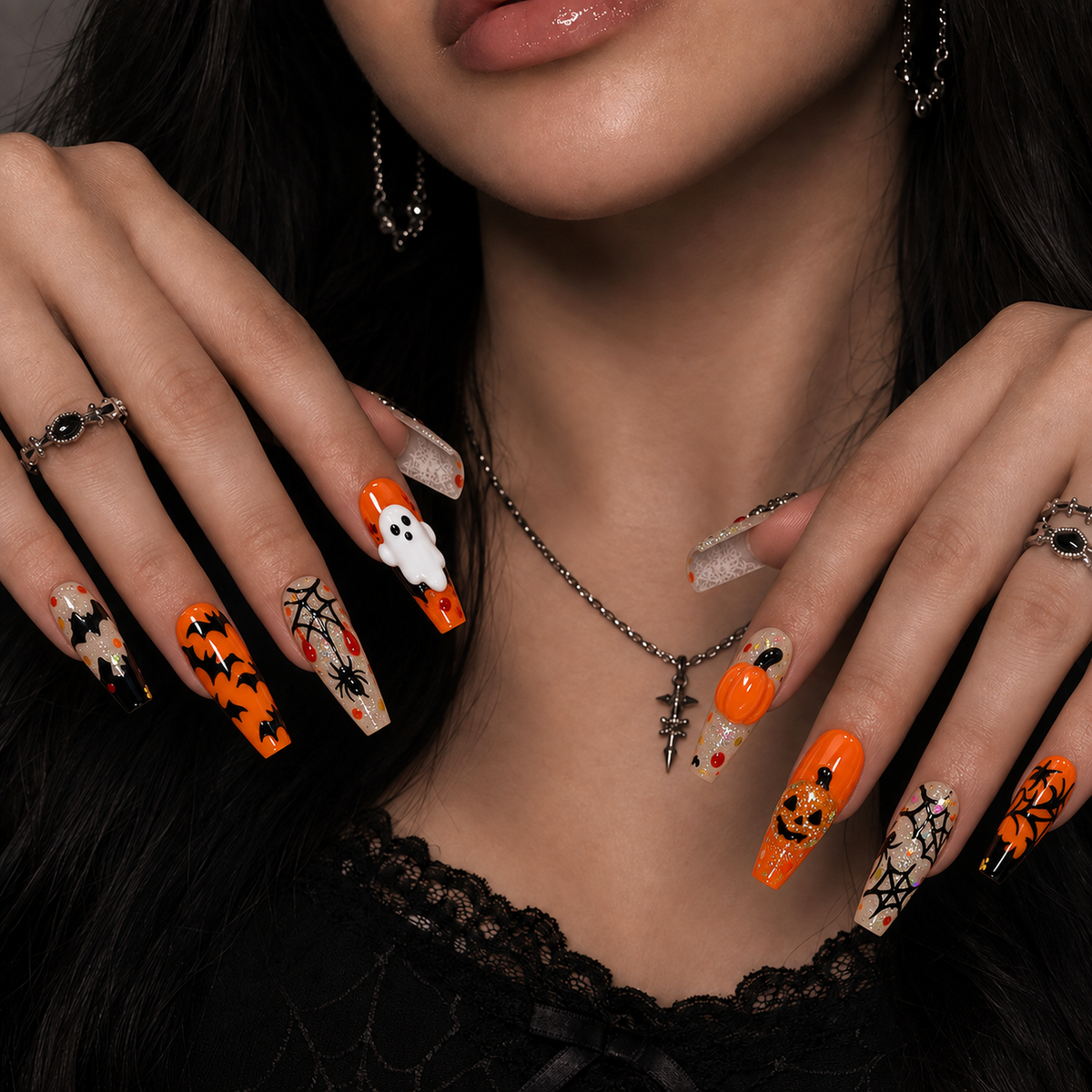 Pumpkin Web Parade press-on nail design with orange pumpkins, friendly ghosts, black bats, and spiderweb art.