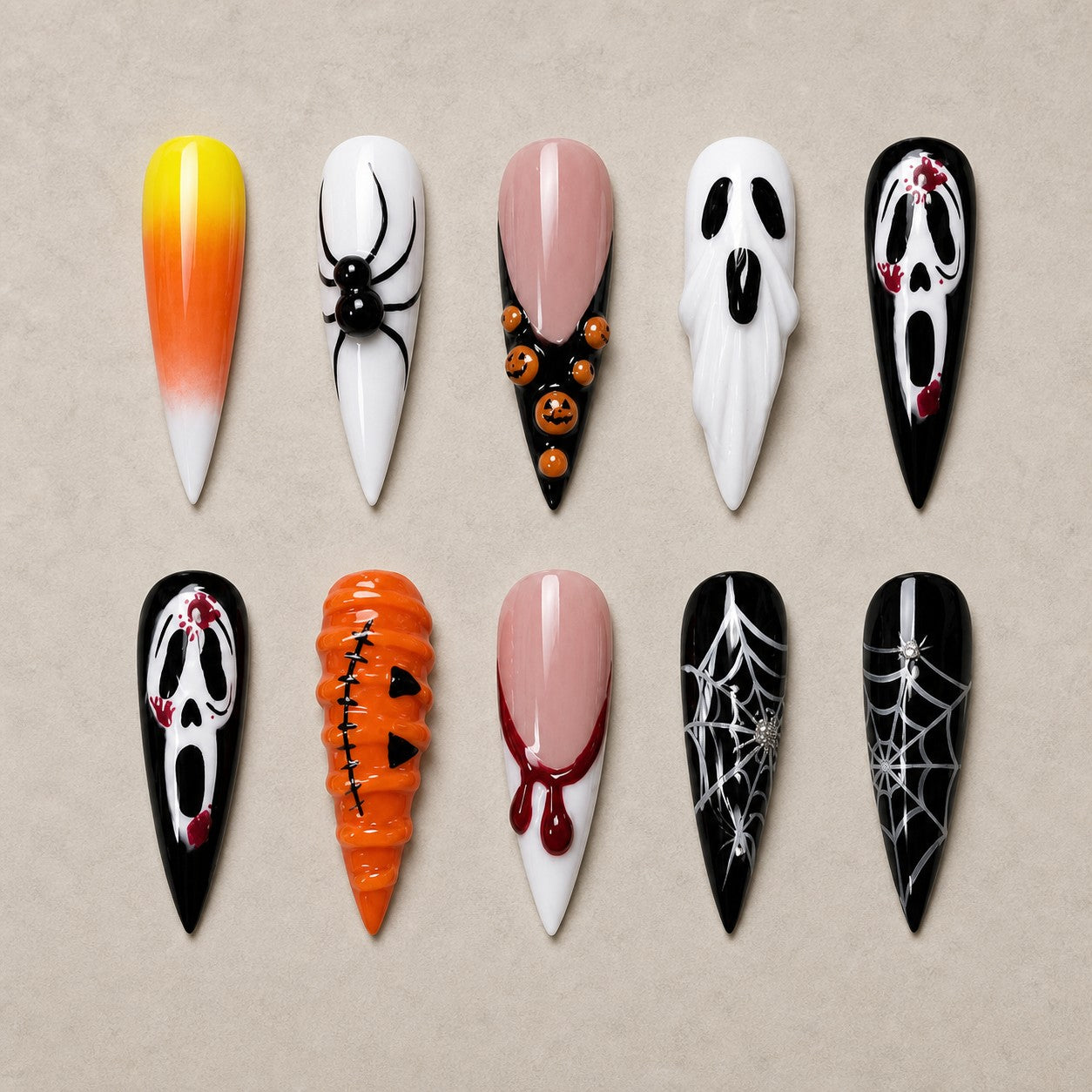 Full set of 10 stiletto press-on nails — Candy Corn Scream Halloween nail art with horror, candy corn, spider
