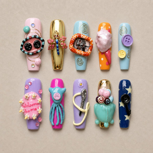 Full set of 10 coffin press-on nails — Curio Buttons Halloween nail art with whimsical, 3d, button