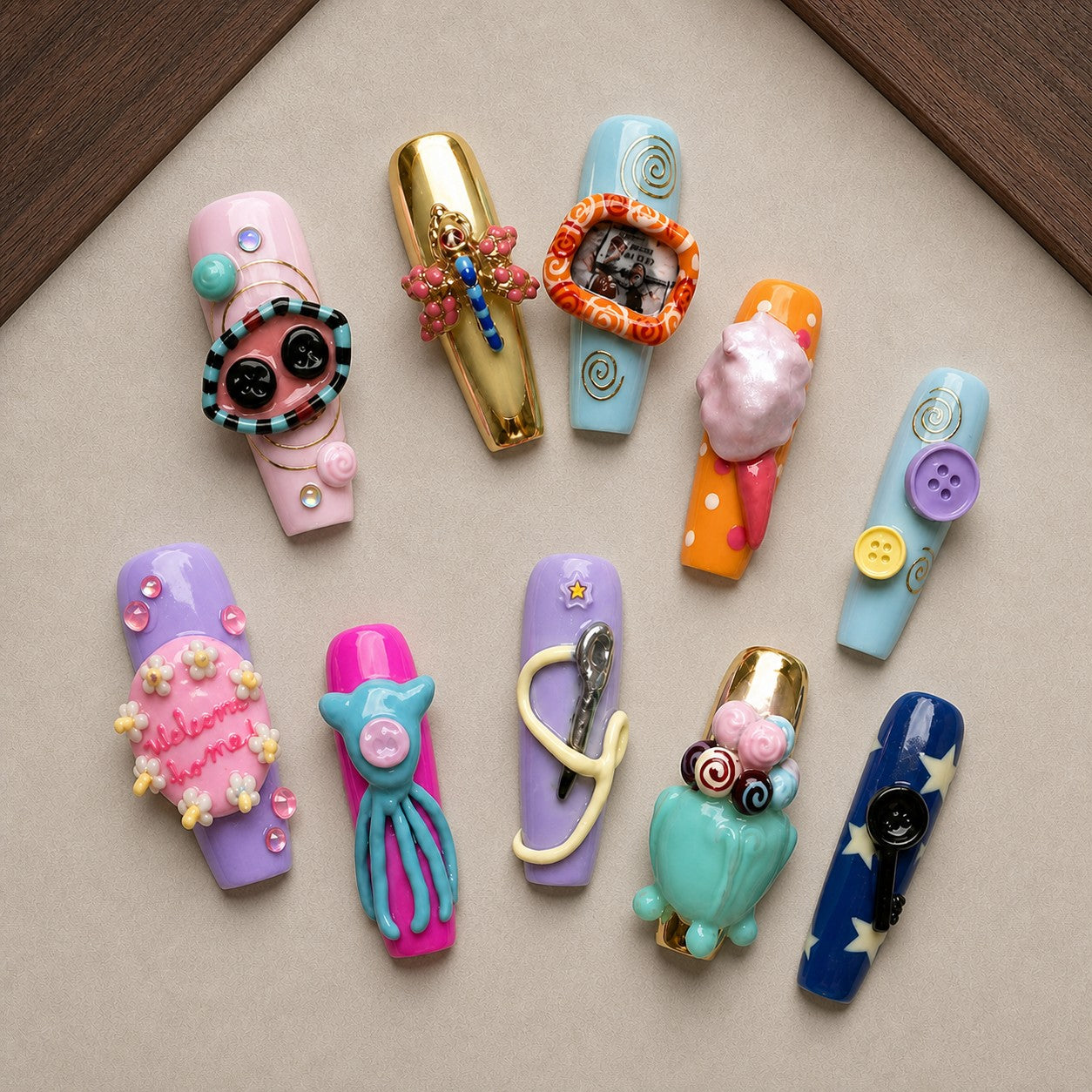 Curio Buttons Halloween press-on nail set displayed in a walnut tray — coffin shape