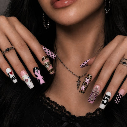 Pink Rebel Press-On Nail Set - press-on nails worn on a hand