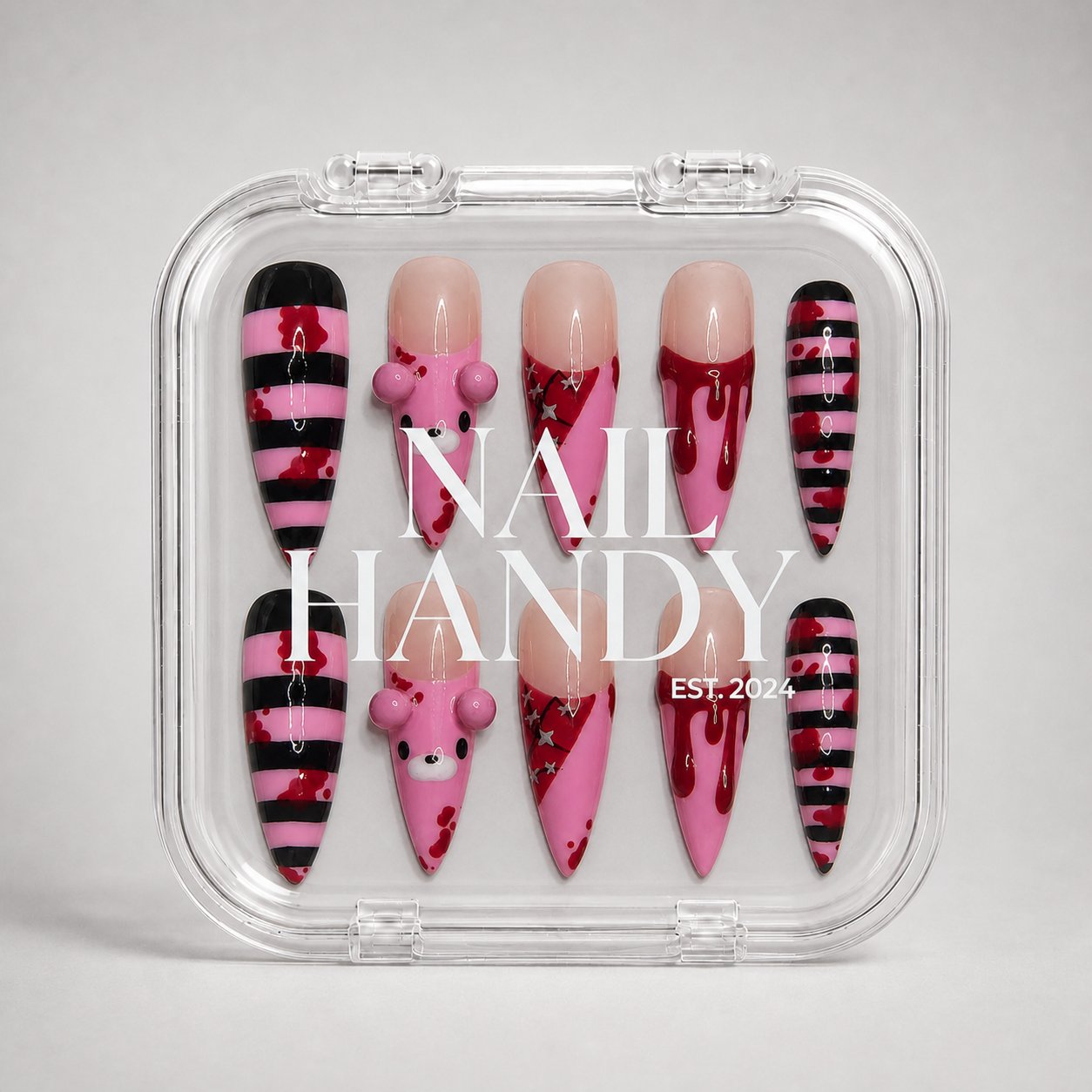 Nail Handy package box for the Cherry Stripe Mischief press-on nail set.