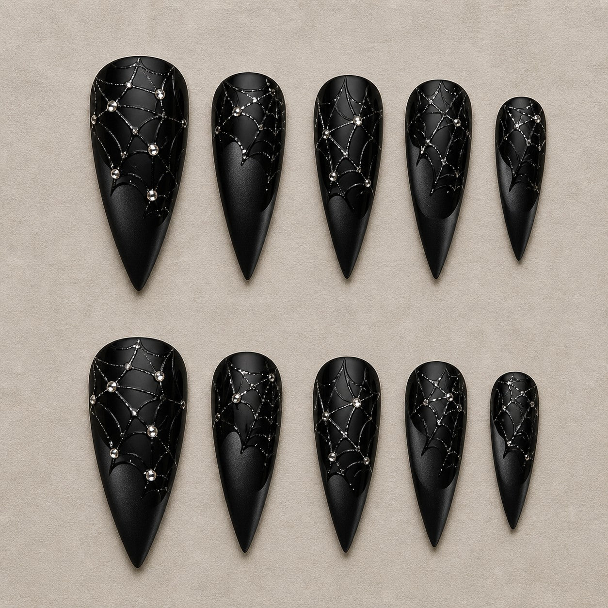 Full set of 10 stiletto press-on nails — Diamond Web Noir Halloween nail art with spider web, matte black, rhinestone