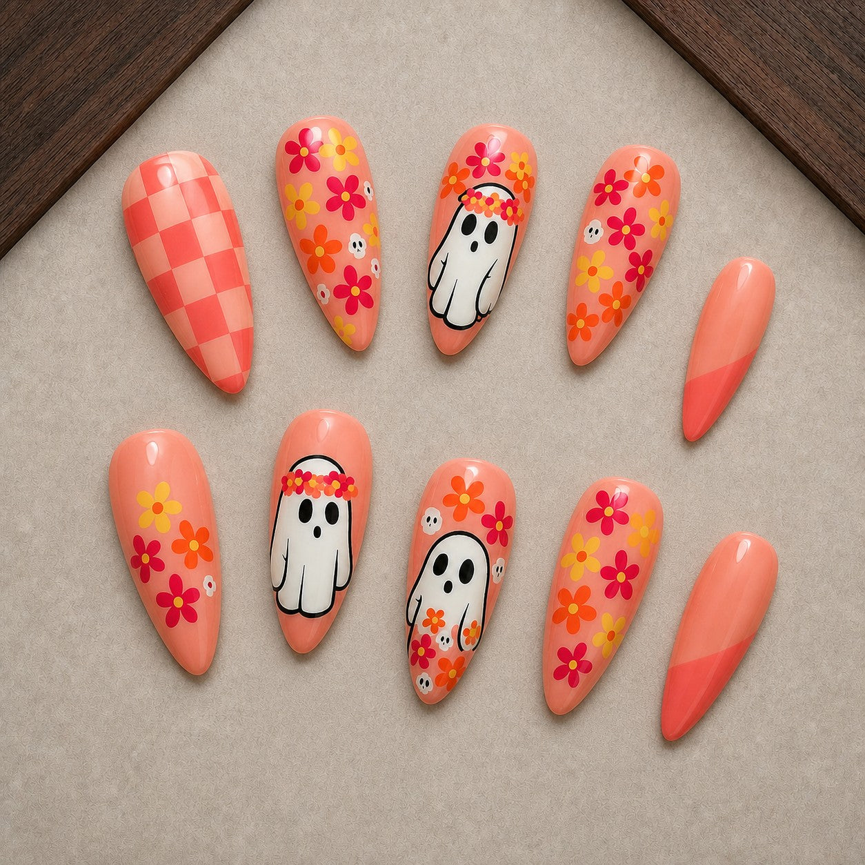 Groovy Ghost Garden Halloween press-on nail set displayed in a walnut tray — almond shape