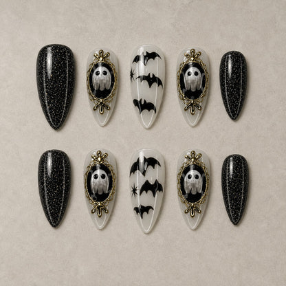 Full set of 10 almond press-on nails — Haunted Cameo Halloween nail art with gothic, cameo, bat